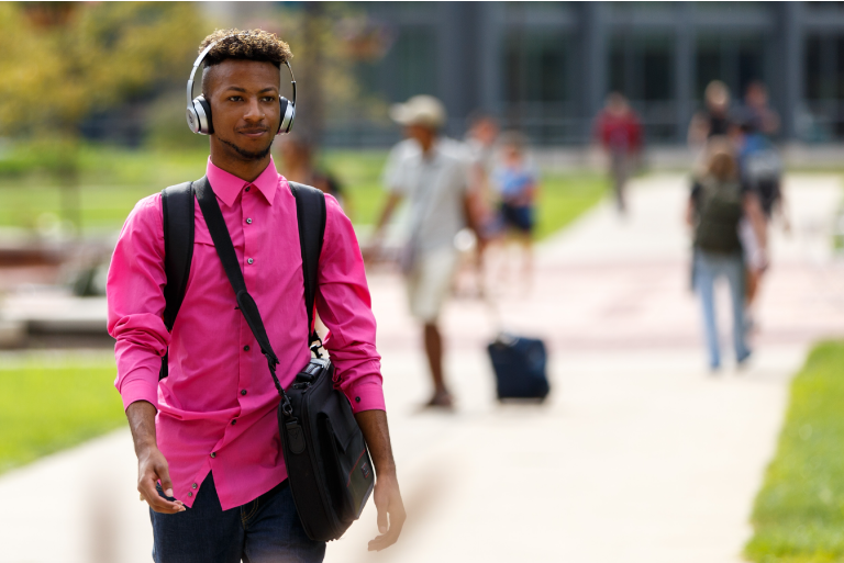 Conference attendees at a vendor table